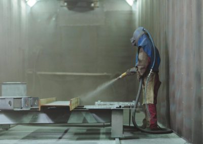 man sand blasting cape town
